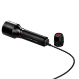Ledlenser P6R Core QC charging with the cable plugged into the tail