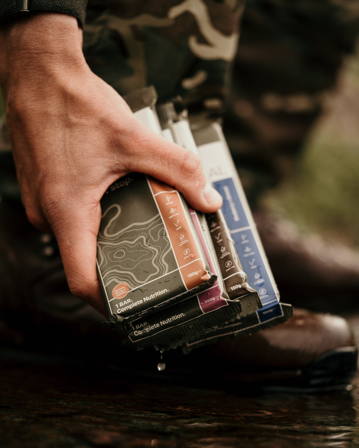Real Meal Food Bar being held outdoors by a soldier