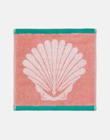 Anorak Shells Organic Cotton Towel - Pink and white face cloth flat lay