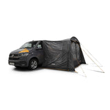 Vango Sunlight awning in smoke with door and walls fitted, attached to a campervan
