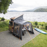 Vango Sunlight awning on a pop-top campervan beside a lake