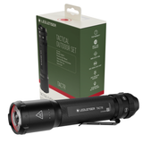 Ledlenser TAC7R tactical torch in front of the green Tactical Outdoor Set retail box