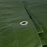 Close-up of an aluminium eyelet in the green side of the Green/Brown L-Grade Tarpaulin 10m x 12m