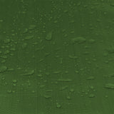 Water droplets on the green surface of the Green/Brown L-Grade Tarpaulin 2m x 3m