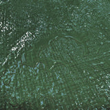 Close-up of water sitting on the woven surface of the Green M-Grade Tarpaulin 5m x 6m