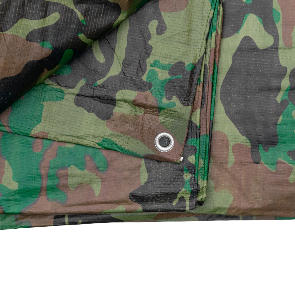 Close-up of the folded edge of the Camouflage M-Grade Tarpaulin 1.5m x 2.4m with an eyelet