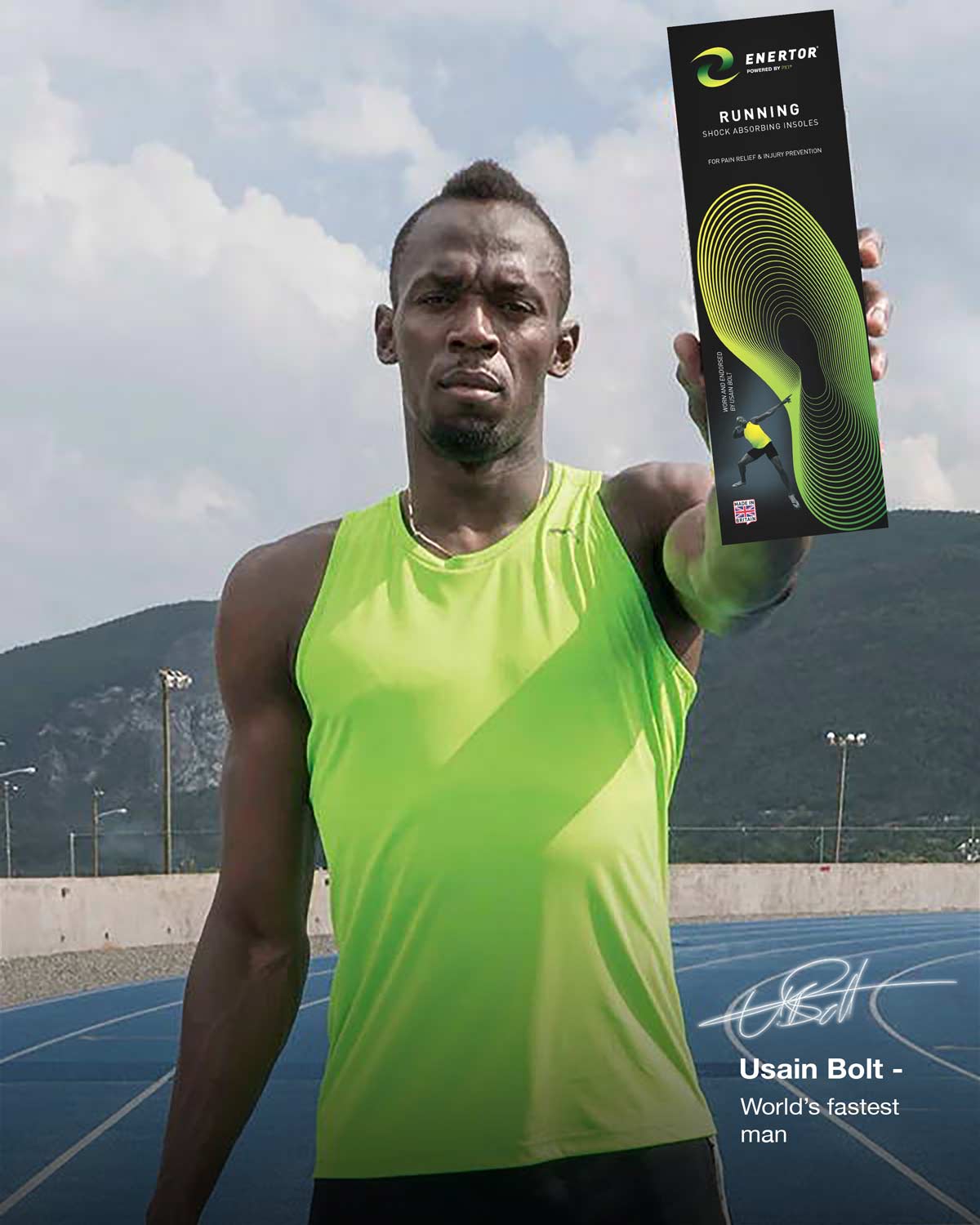 Usain Bolt holding a box of Enertor Running insoles on an athletics track