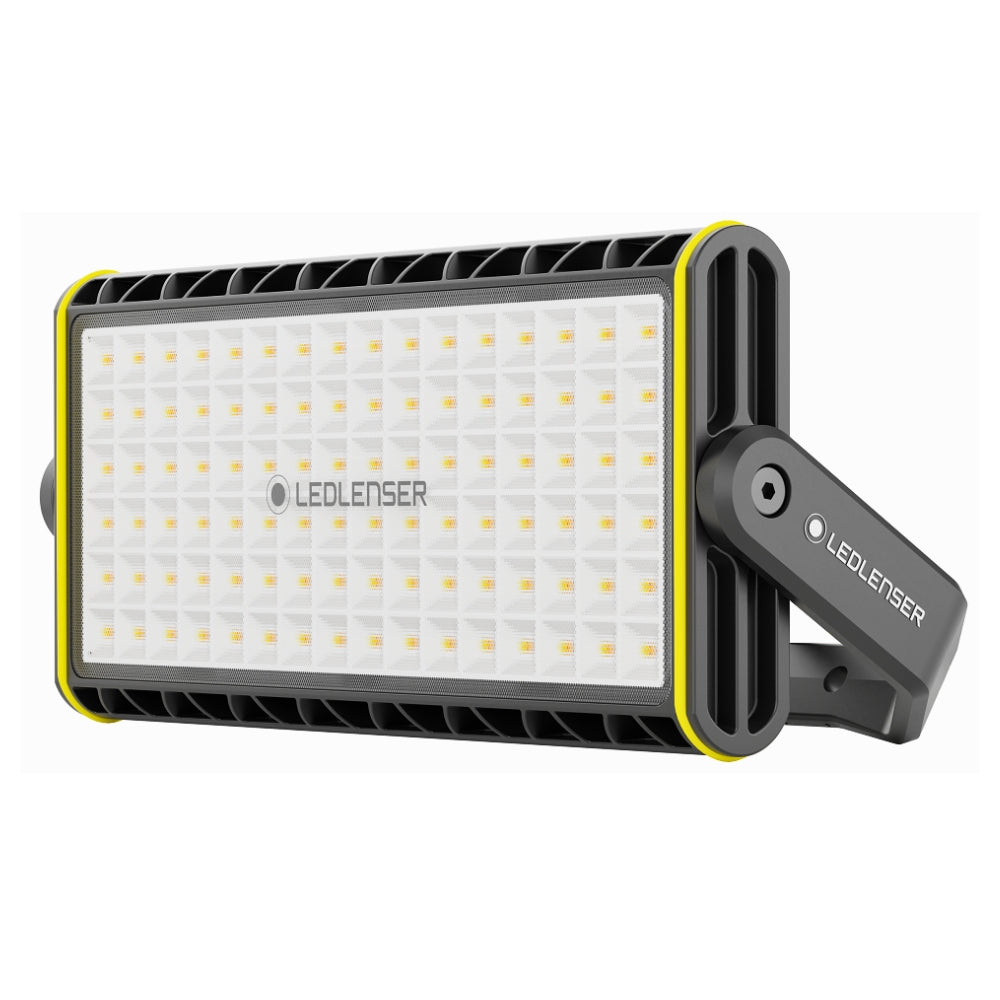 Ledlenser AF12R Work area light in its pivoting U-bracket, showing the wide panel of warm and cool white LEDs