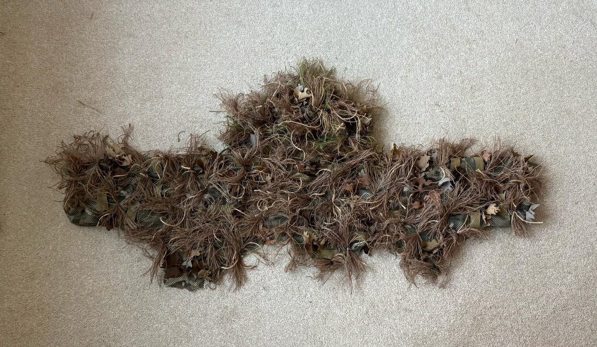 A second head and shoulders build laid flat, in a lighter tan hessian blend with small fabric leaves worked in