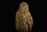 Mid cape ghillie suit shot against a black background, showing the hood and the hessian drape falling to the waist