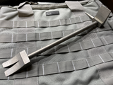 12 in Titanium Hooligan Bar lying on a kit bag with webbing panels