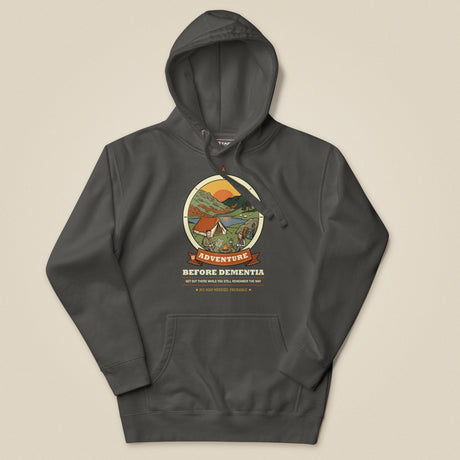 Adventure Before Dementia Camping Hoodie in Vintage Black, laid flat, front view
