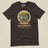 Adventure Before Dementia Campervan T-Shirt in Brown, laid flat, front view