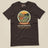 Adventure Before Dementia Camping T-Shirt in Brown, laid flat, front view
