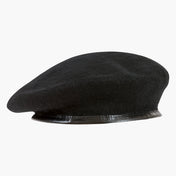 Highlander British Army Style Beret in Black - side view of wool beret showing classic military shape and leather trim on white background