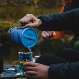 Highlander Blade Fastboil 3 Camping Gas Stove 1.1L in blue lifestyle for camping