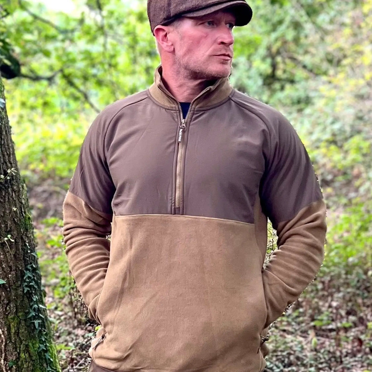 Jack Pyke Bleasdale Half Zip Fleece Top in dark mustard on a man outdoors