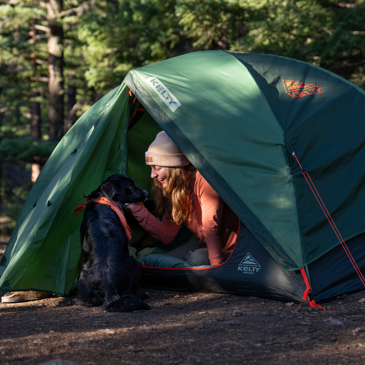 Kelty Wireless 2P Tent - Dill Black Forest camper at the doorway