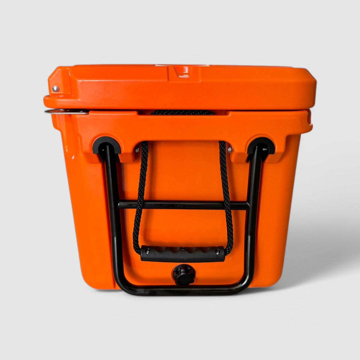 Handle end of the orange Orbie 55 cool box, with the folding steel tow handle, rope loop and screw-out drain plug