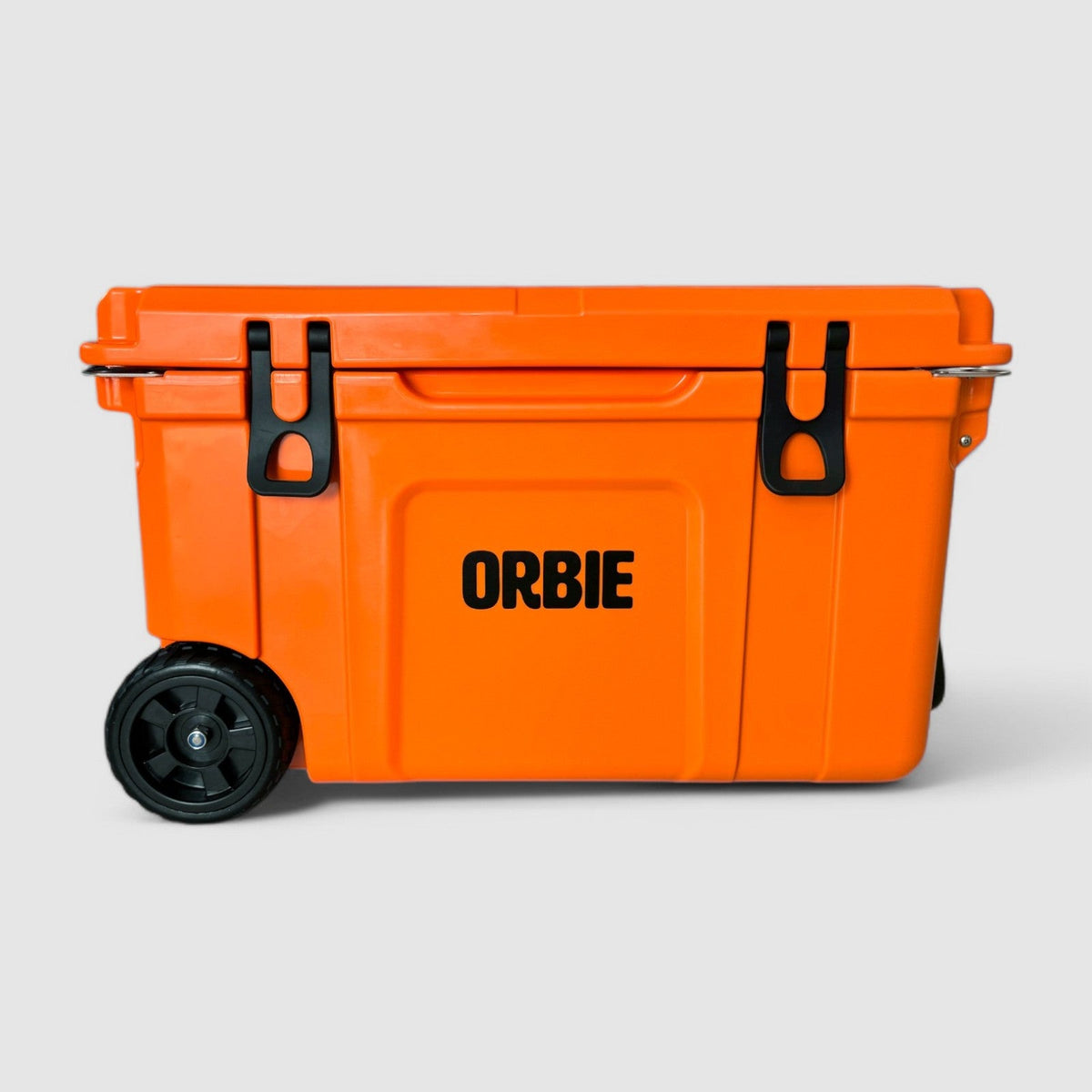 Orbie 55 wheeled cool box in orange, side view with the treaded wheels at one end and both cam latches closed