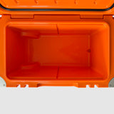 Empty interior of the orange Orbie 55 cool box, showing the moulded basket rails and the internal drain outlet