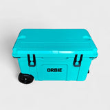 Orbie 55 cool box in turquoise from above at an angle, with the moulded lid ruler and both cup holders in view