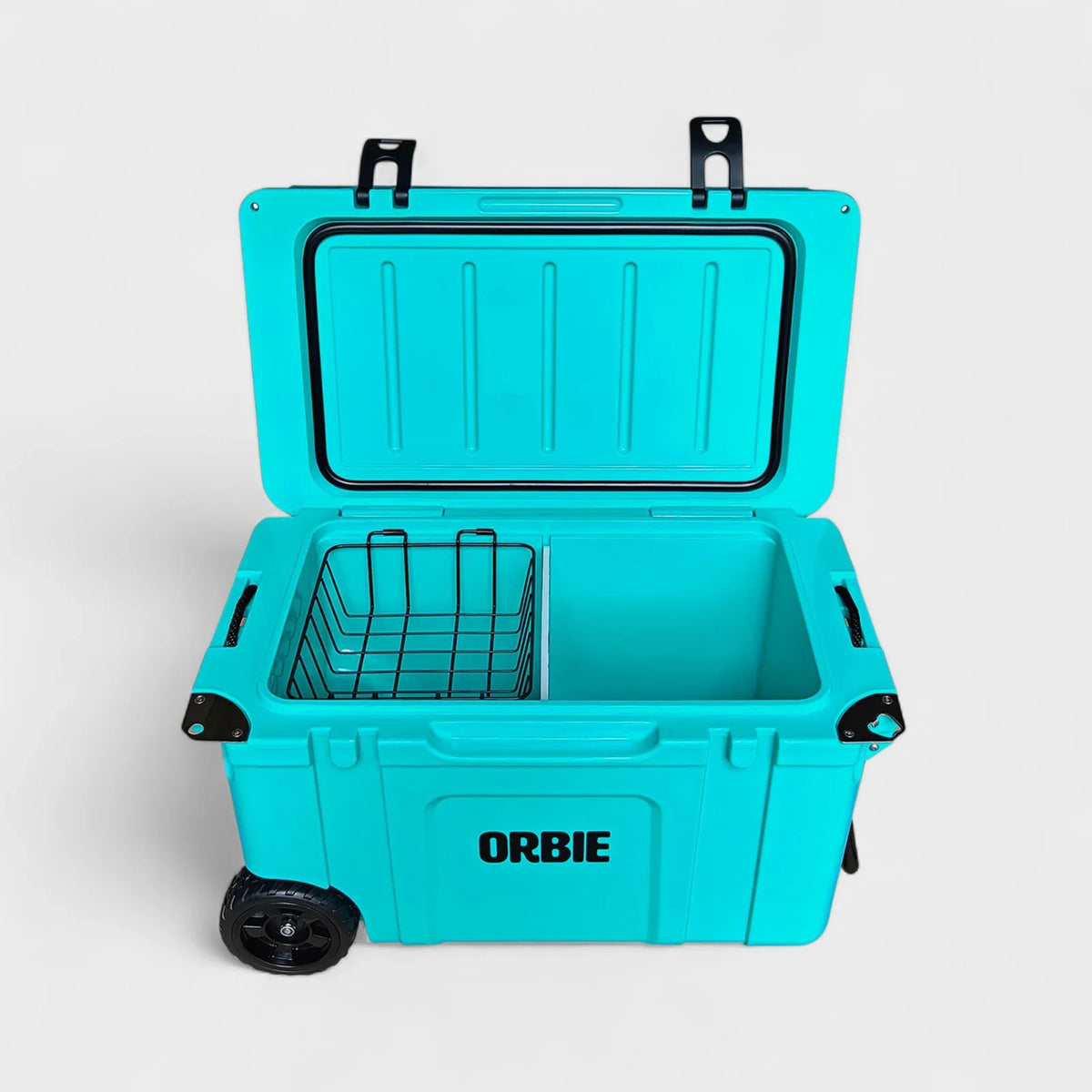Orbie 55 cool box in turquoise open from the front, showing the lid gasket, basket and divider