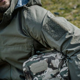 Highlander Cyclone Pro Waterproof Jacket in ranger green close up of the arm pocket