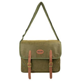 Jack Pyke Duotex Dog Bag in green hanging from its fully extended shoulder strap