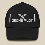 Task "Drone Pilot" cotton twill cap in Black, front view with white embroidered drone, DRONE PILOT text and propeller blades
