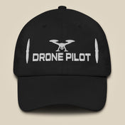 Task "Drone Pilot" cotton twill cap in Black, front view with white embroidered drone, DRONE PILOT text and propeller blades