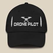 Task "Drone Pilot" cotton twill cap in Black, front view with white embroidered drone, DRONE PILOT text and propeller blades