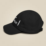 Task "Drone Pilot" cap in Black, side view with the brim to the left, showing the curved peak and the embroidery wrapping round the front