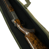 Engraved shotgun action and figured walnut stock in the black lining of the green Duotex slip