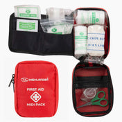 Highlander Midi First Aid Kit Red - pouch open showing internal organiser compartments with bandages and scissors visible
