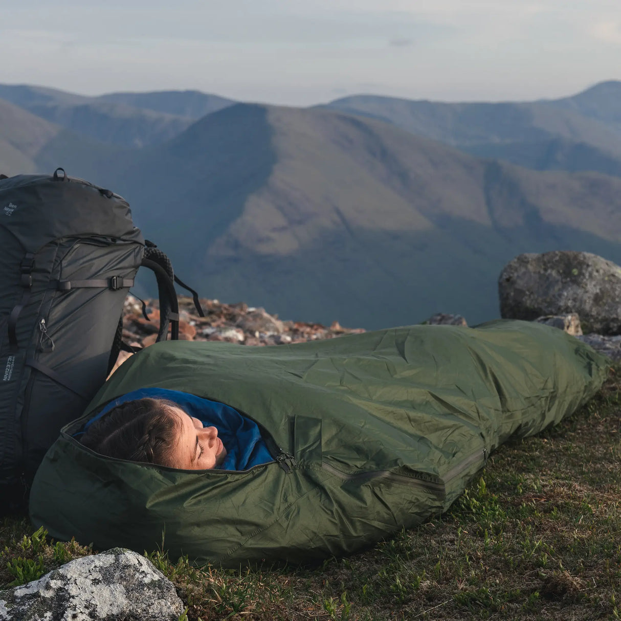 Highlander Hawk Waterproof Bivvy Bag being used outdoors - for camping