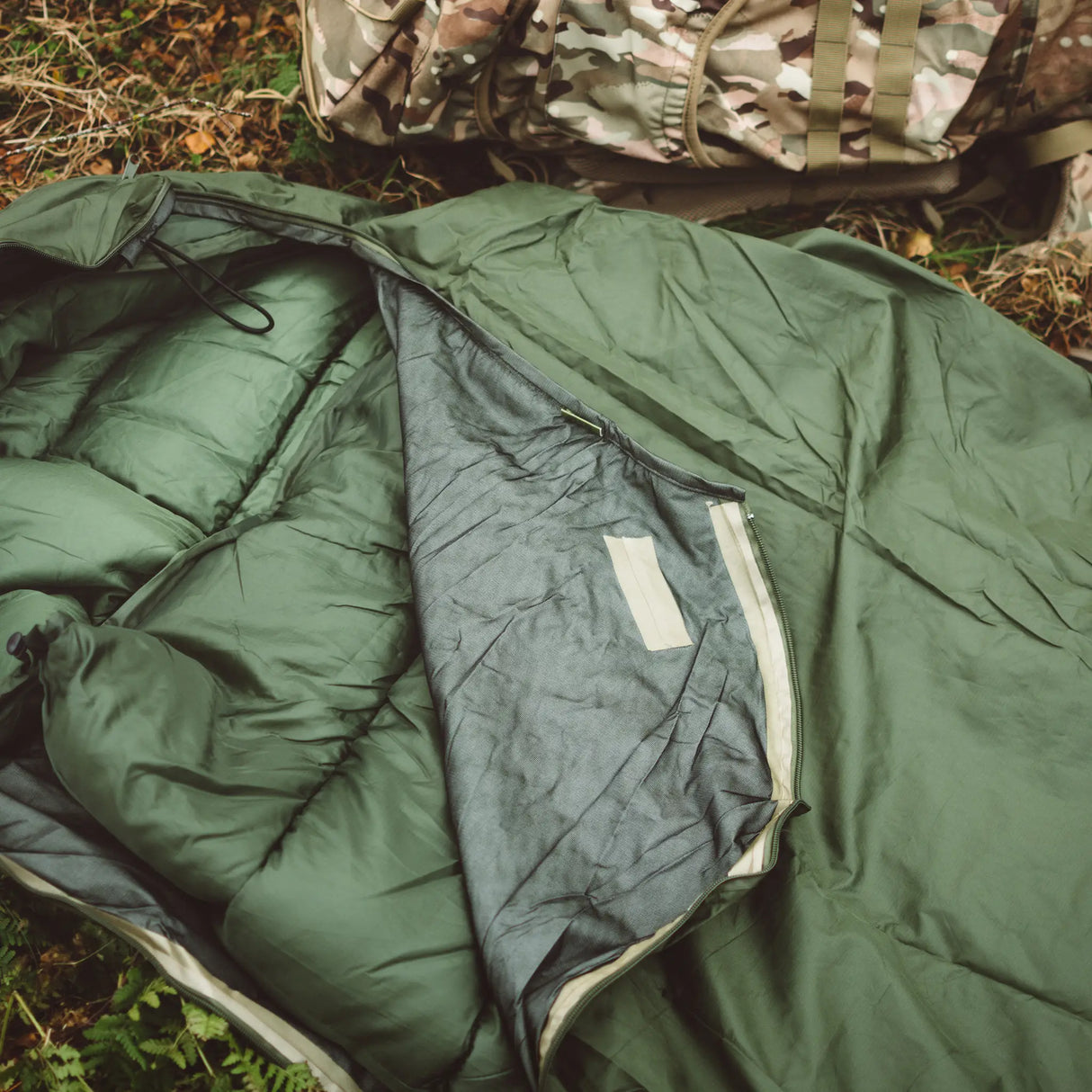 Highlander Hawk Waterproof Bivvy Bag being used outdoors - for camping