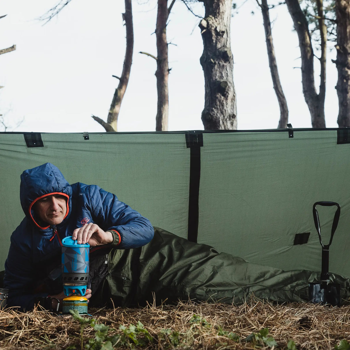 Highlander Hawk Waterproof Bivvy Bag being used outdoors - for camping