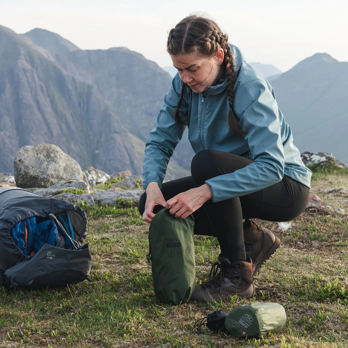 Highlander Hawk Waterproof Bivvy Bag being used outdoors - for camping