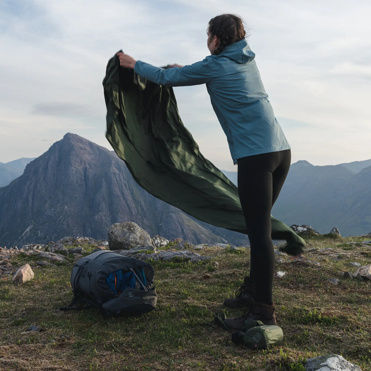 Highlander Hawk Waterproof Bivvy Bag being used outdoors - for trekking
