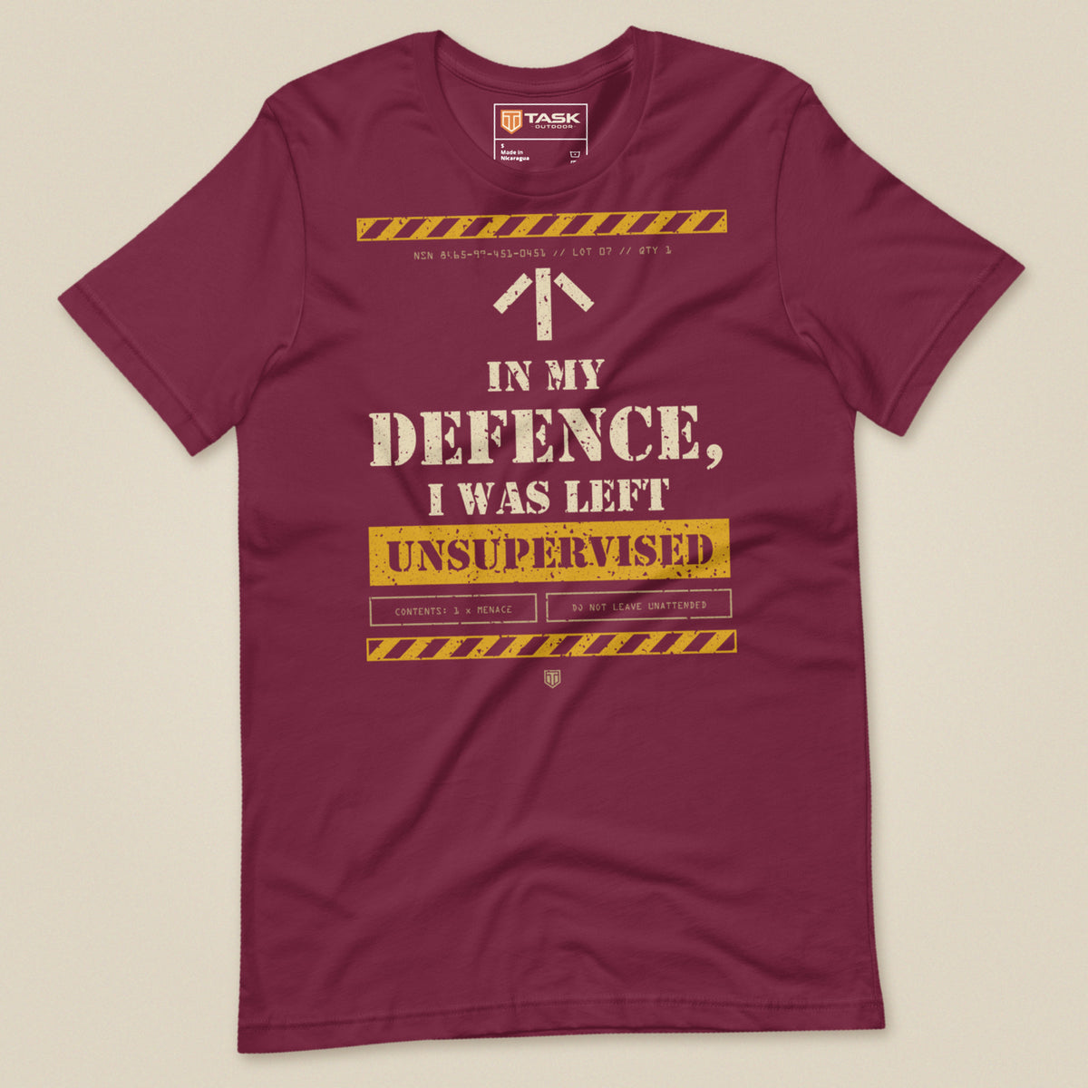 Task "In My Defence, I Was Left Unsupervised" T-shirt in Maroon, laid flat, front view