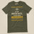 Task "In My Defence, I Was Left Unsupervised" T-shirt in Military Green, laid flat, front view
