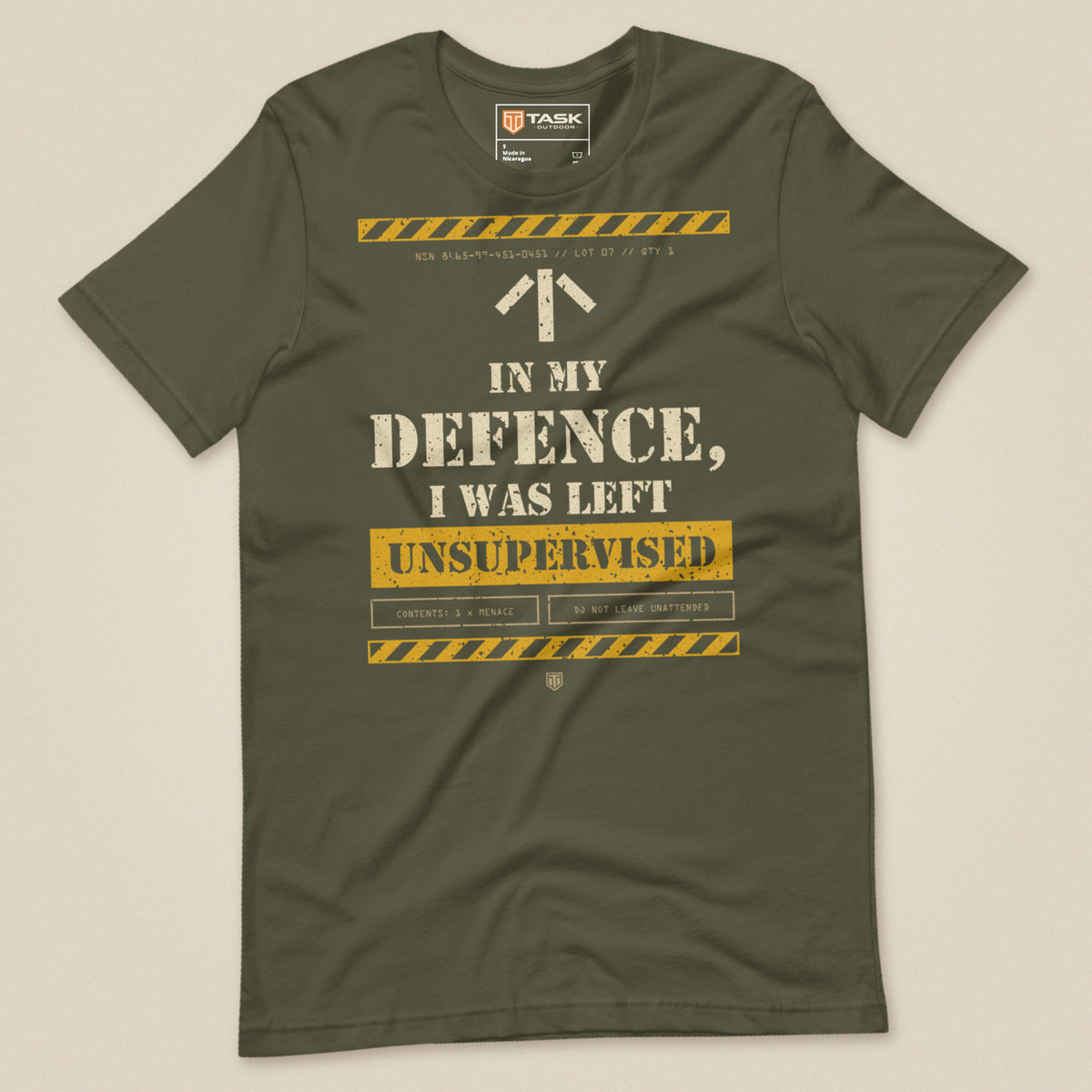 Task "In My Defence, I Was Left Unsupervised" T-shirt in Military Green, laid flat, front view