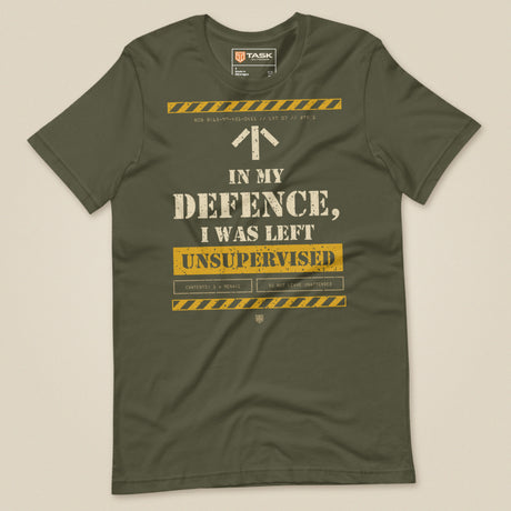 Task "In My Defence, I Was Left Unsupervised" T-shirt in Military Green, laid flat, front view
