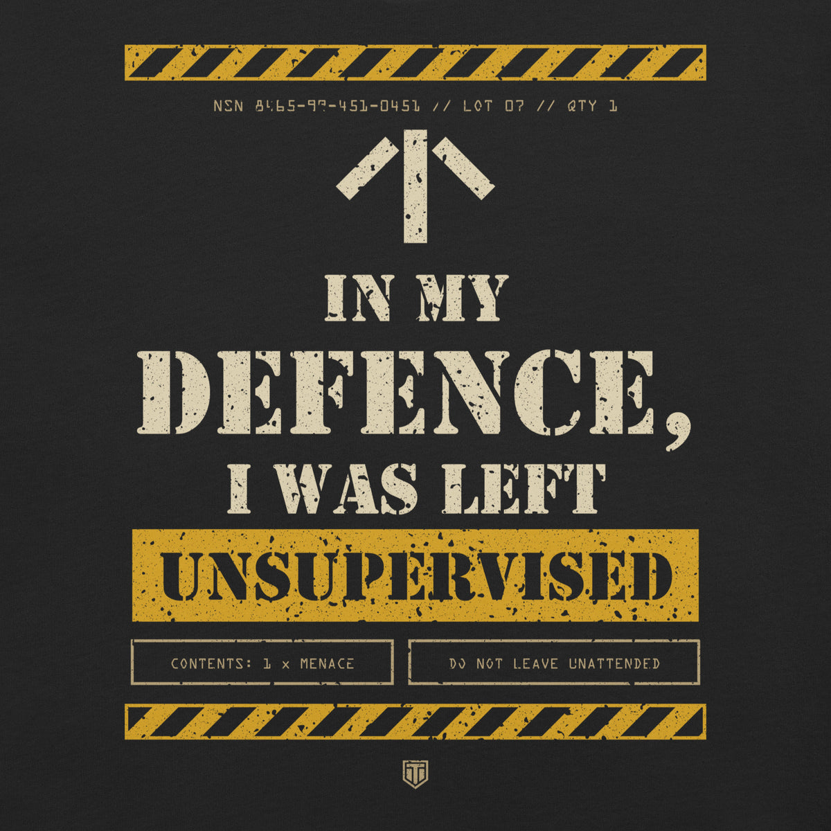 Close-up of the "In My Defence, I Was Left Unsupervised" print on Vintage Black: stencil slogan, yellow hazard stripes and Contents: 1 x Menace label