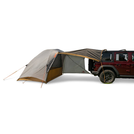 Kelty Caboose 4 Vehicle Tent - Smoke Beluga Dull Gold pitched with awning