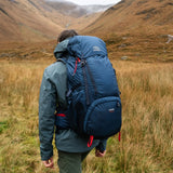 Highlander Ivar Men's Rucksack 50L - Navy Blue worn by hiker in a Highland glen