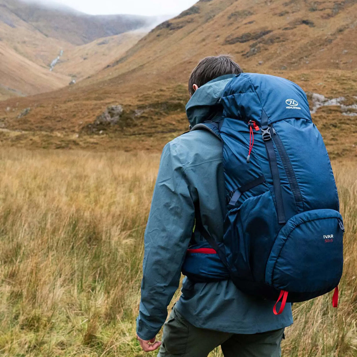 Highlander Ivar Men's Rucksack 50L - Navy Blue rear view worn on the trail