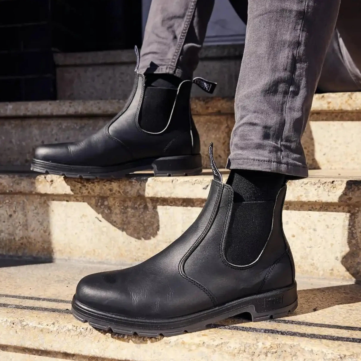 Mongrel K9 Dealer Boot - Black worn on stone steps