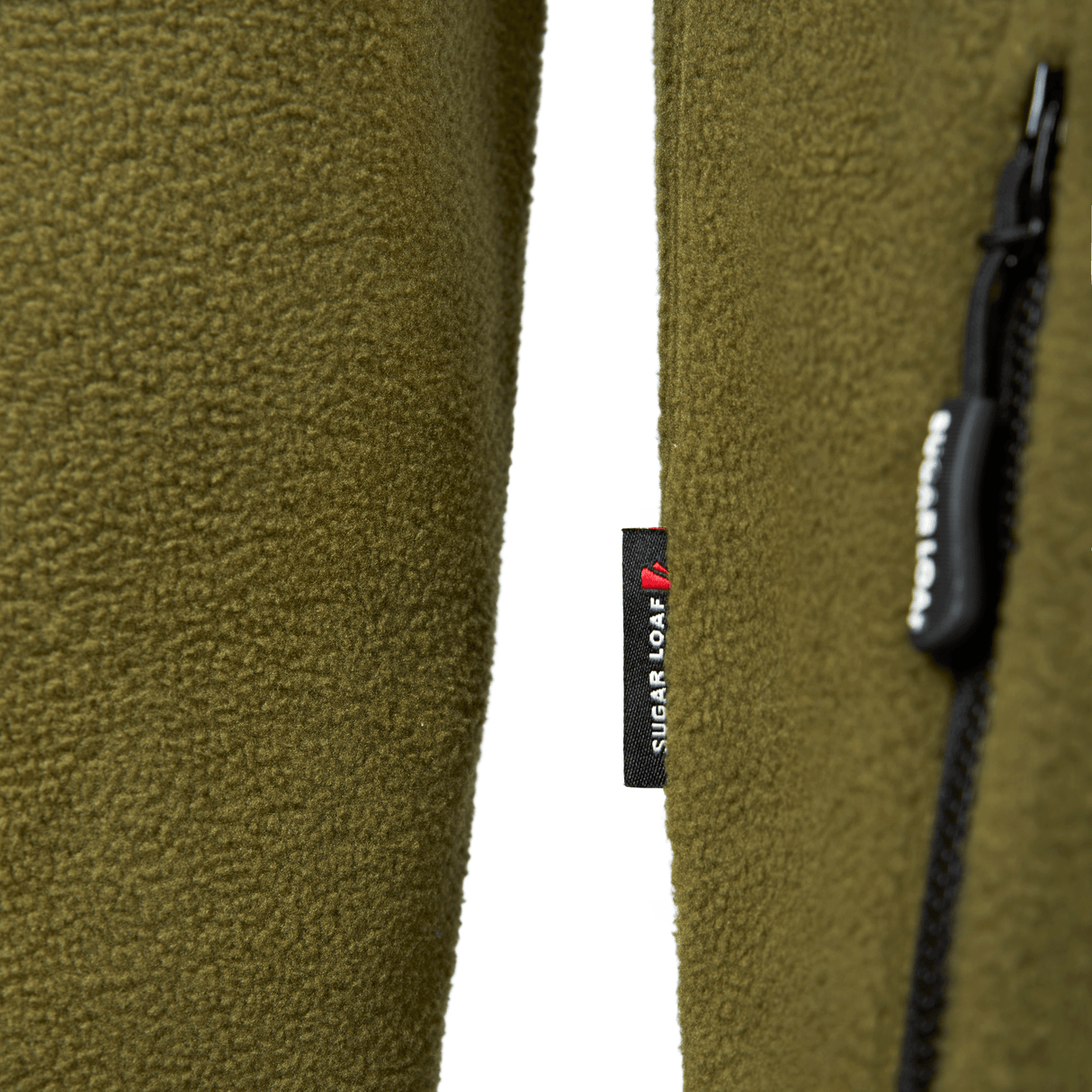 Close-up of a Sugar Loaf Shepherd Polar Fleece Hoodie in Khaki with a brand tag on a white background